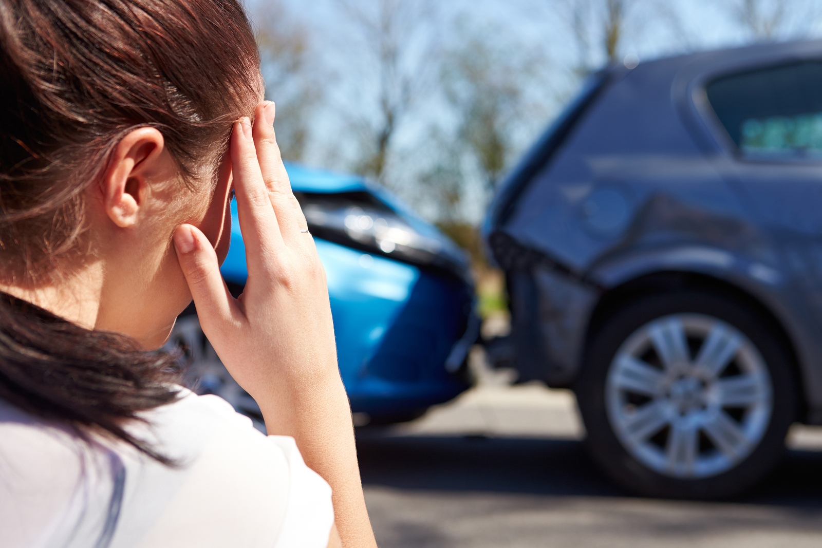 Woman suffering from an auto accident injury